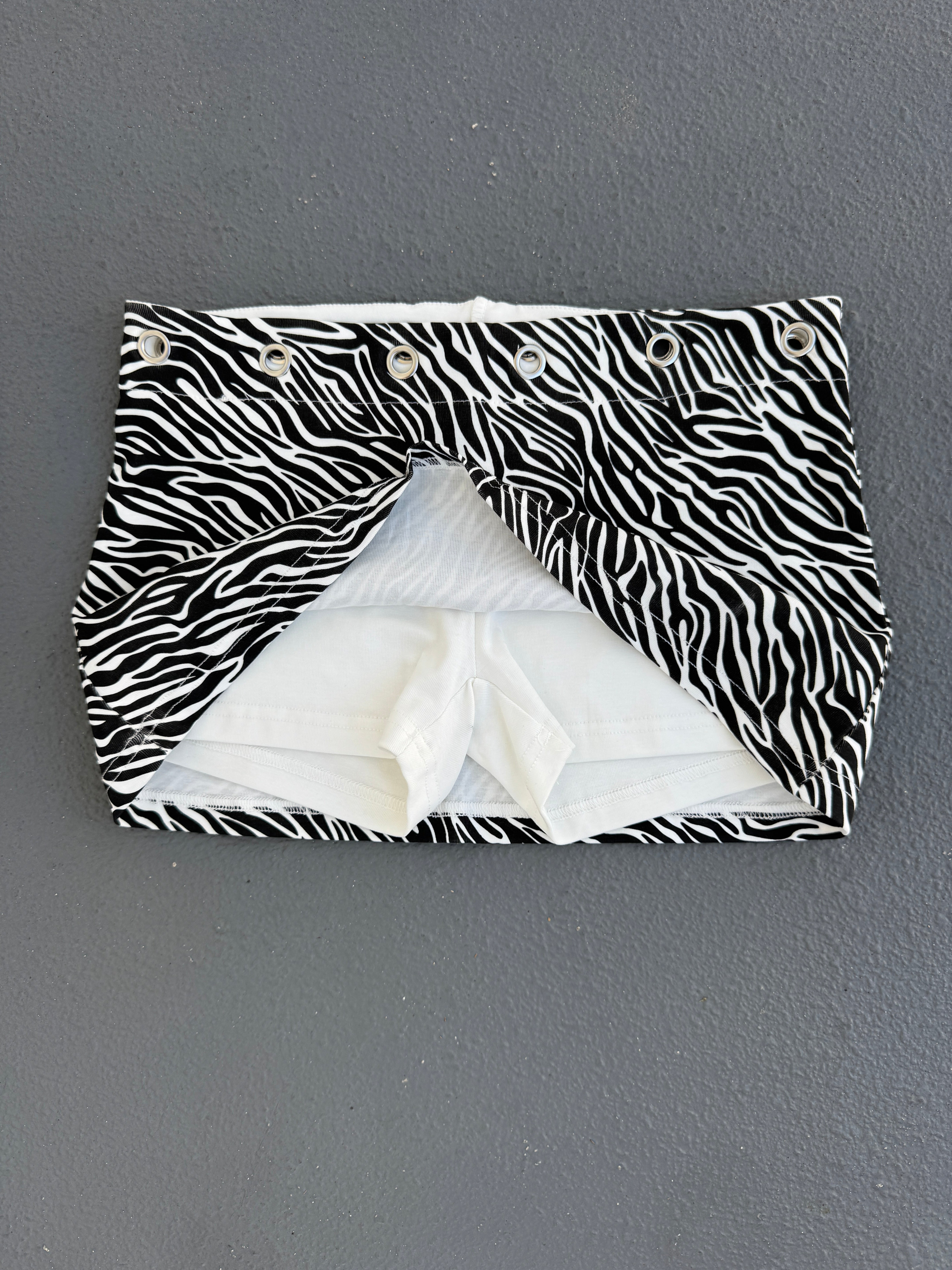 8 left - Zebra Eyelet Mini Skirt